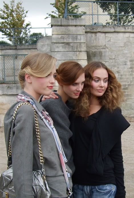 Vlada Roslyakova, Olga Sherer, Inguna Butane outside Viktor & Rolf Spring 2008 fashion show