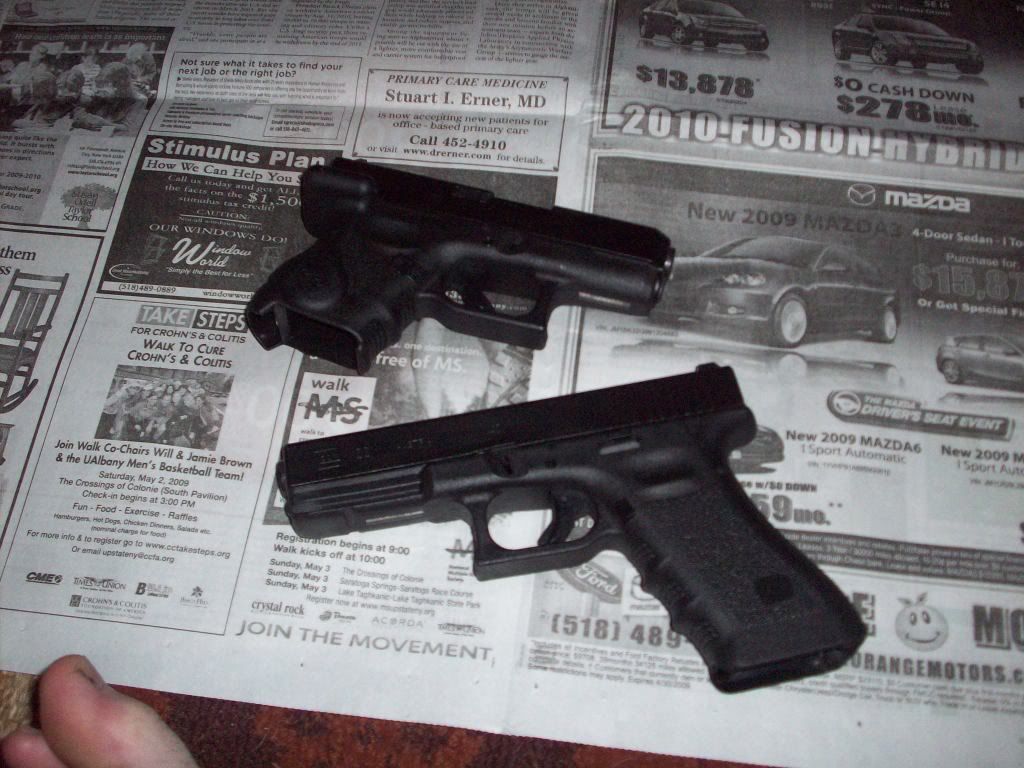 http://i213.photobucket.com/albums/cc250/pilar611/glock6.jpg