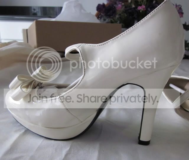 white platform heels with bow